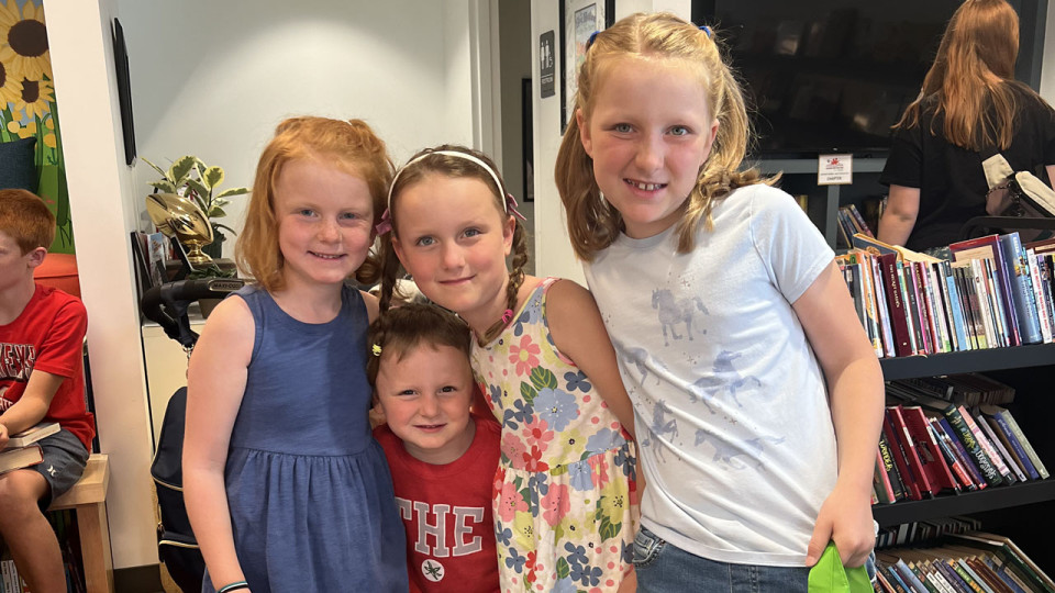 Group of children posing and smiling